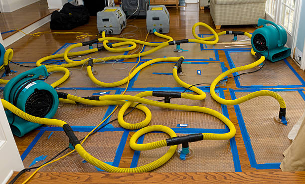 Professional Storm Water Damage Restoration technician working in Waterford, NY